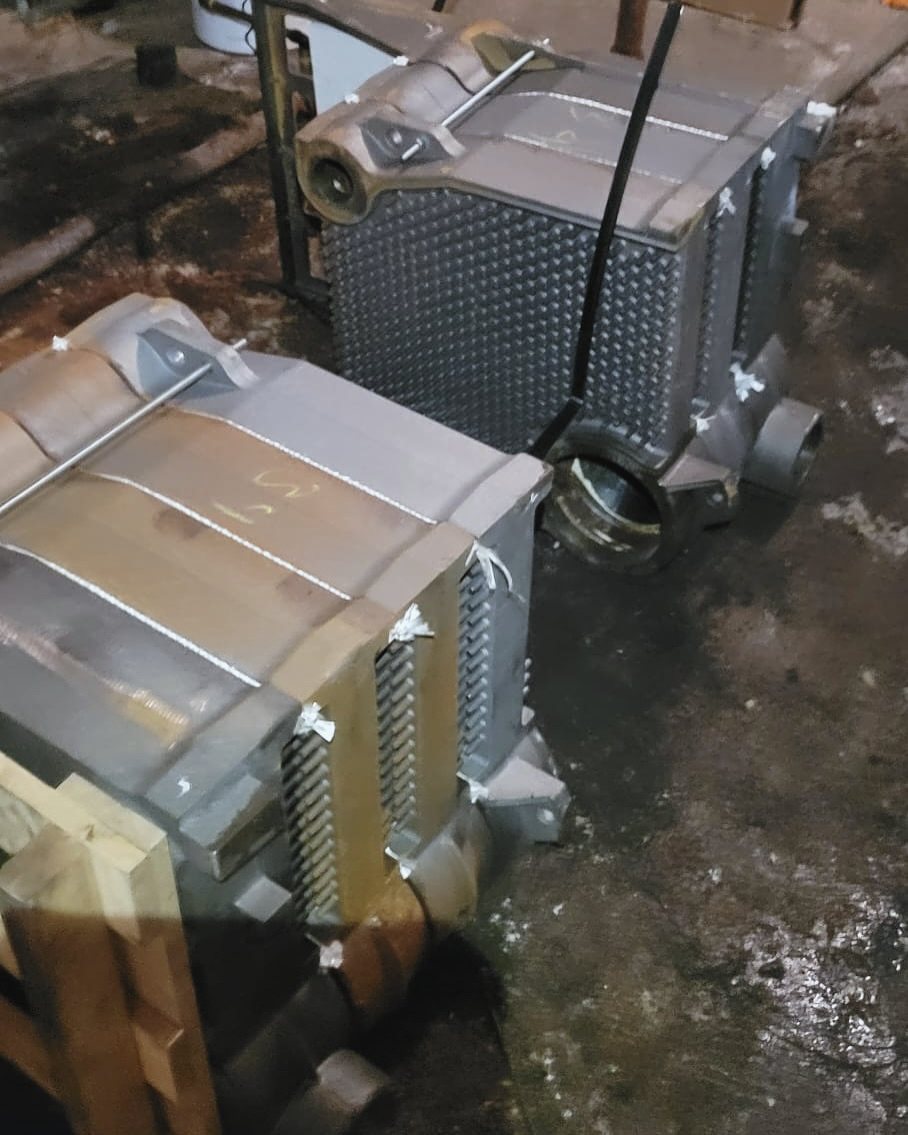 New cast-iron boiler sections ready for assembly